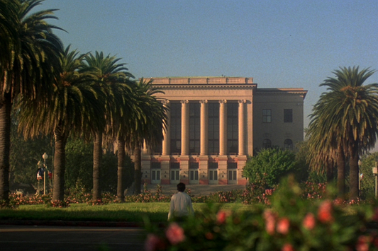 Front entrance of the Wiley W. Manuel Courthouse in downtown Oakland on a bright weekday morning