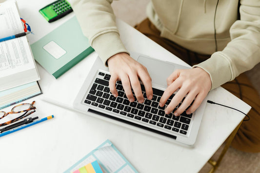 Person preparing their own California small claims case at a sunny home desk